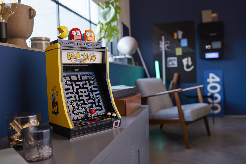 the new LEGO Ideas PAC-MAN Arcade set disposed inside a room